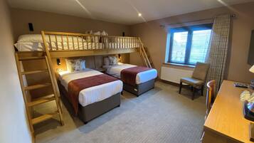 Superior Family Room | Desk, blackout curtains, soundproofing, iron/ironing board