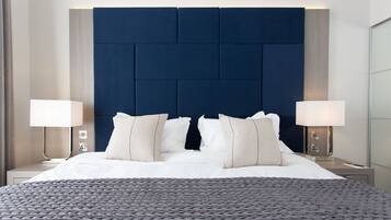 Premium bedding, in-room safe, blackout curtains, soundproofing