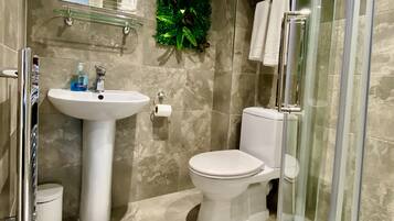 Standard Double Room | Bathroom | Shower, free toiletries, hair dryer, towels