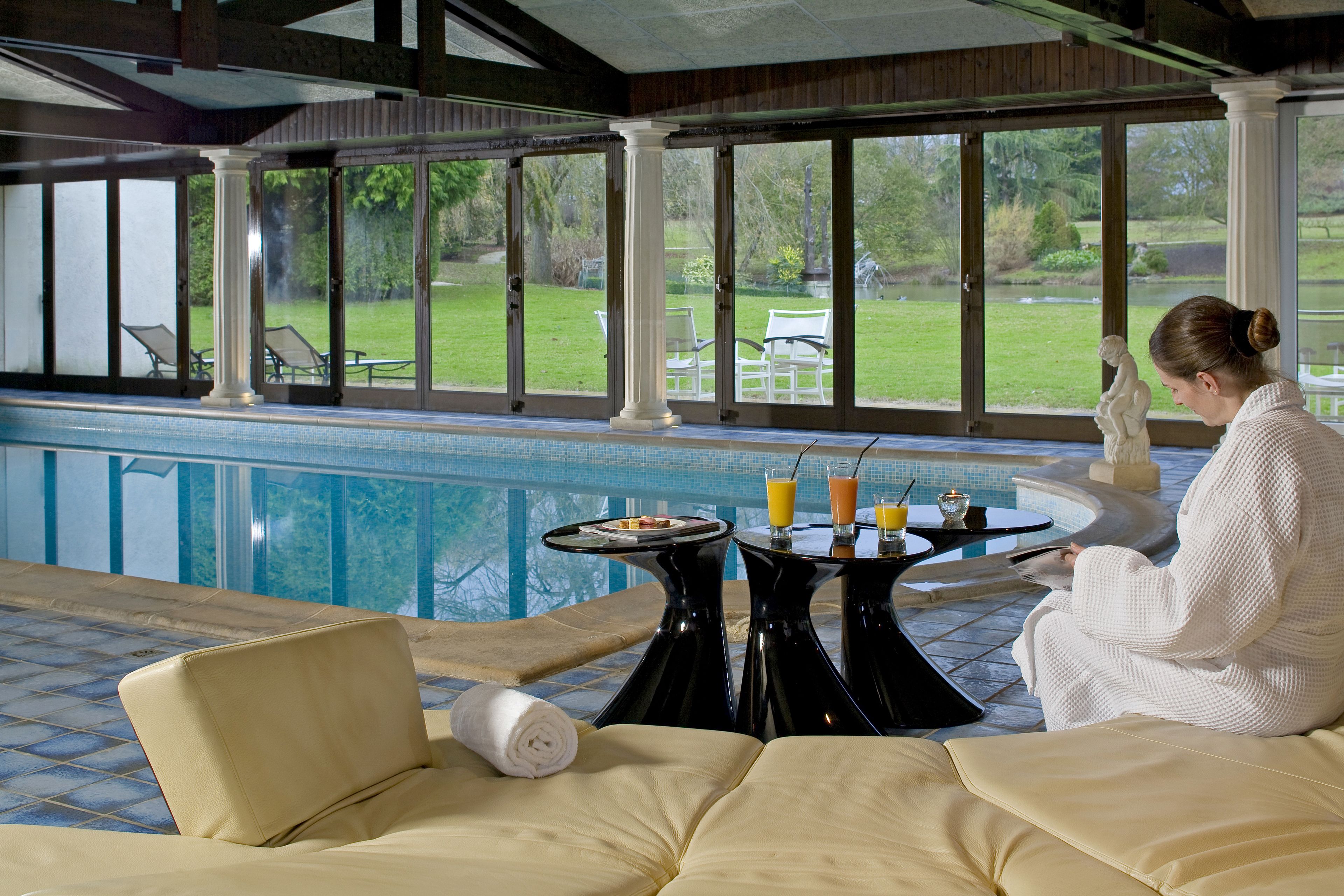 indoor pool, open 8:00 am to 8:00 pm, pool loungers