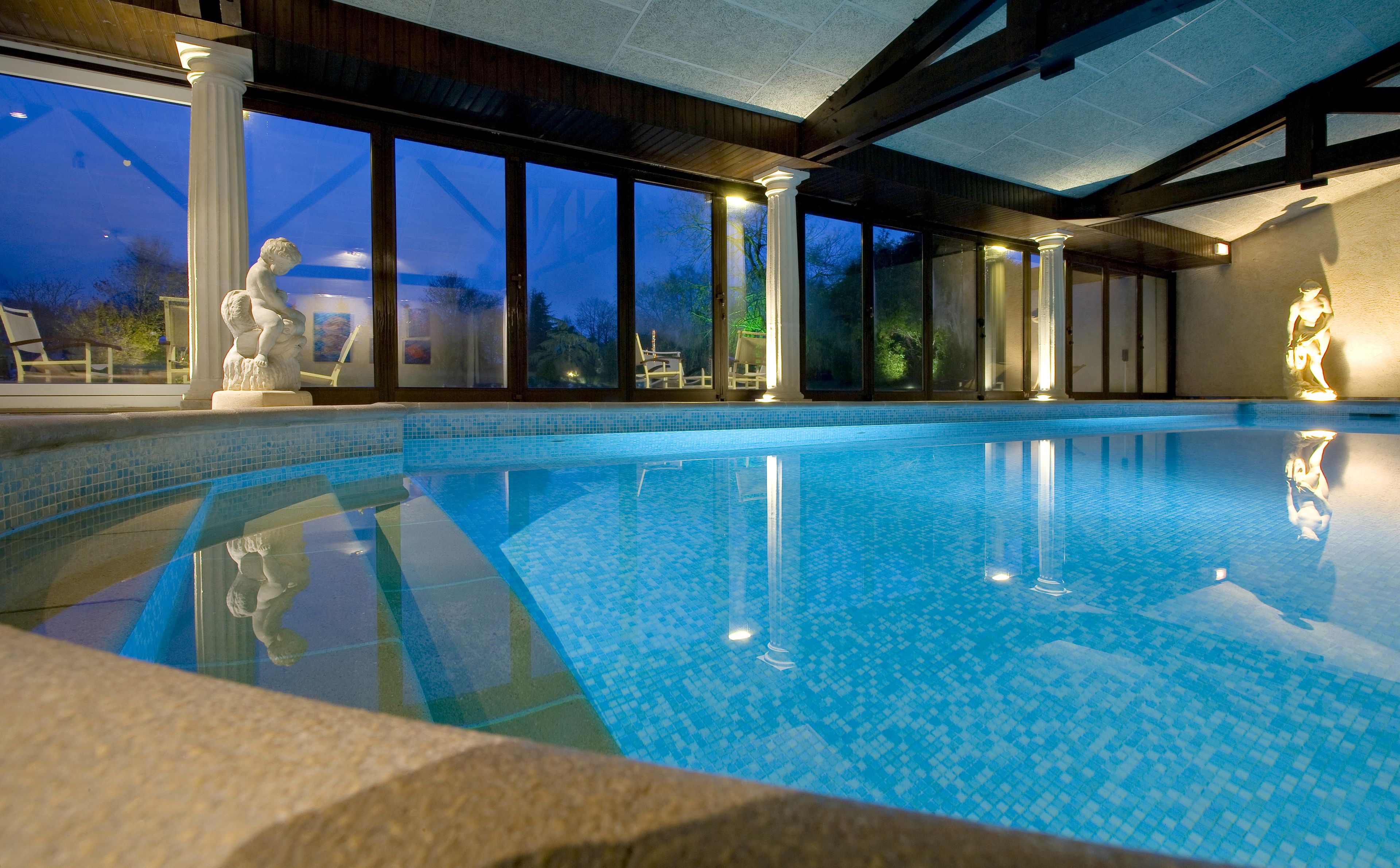 indoor pool, open 8:00 am to 8:00 pm, pool loungers