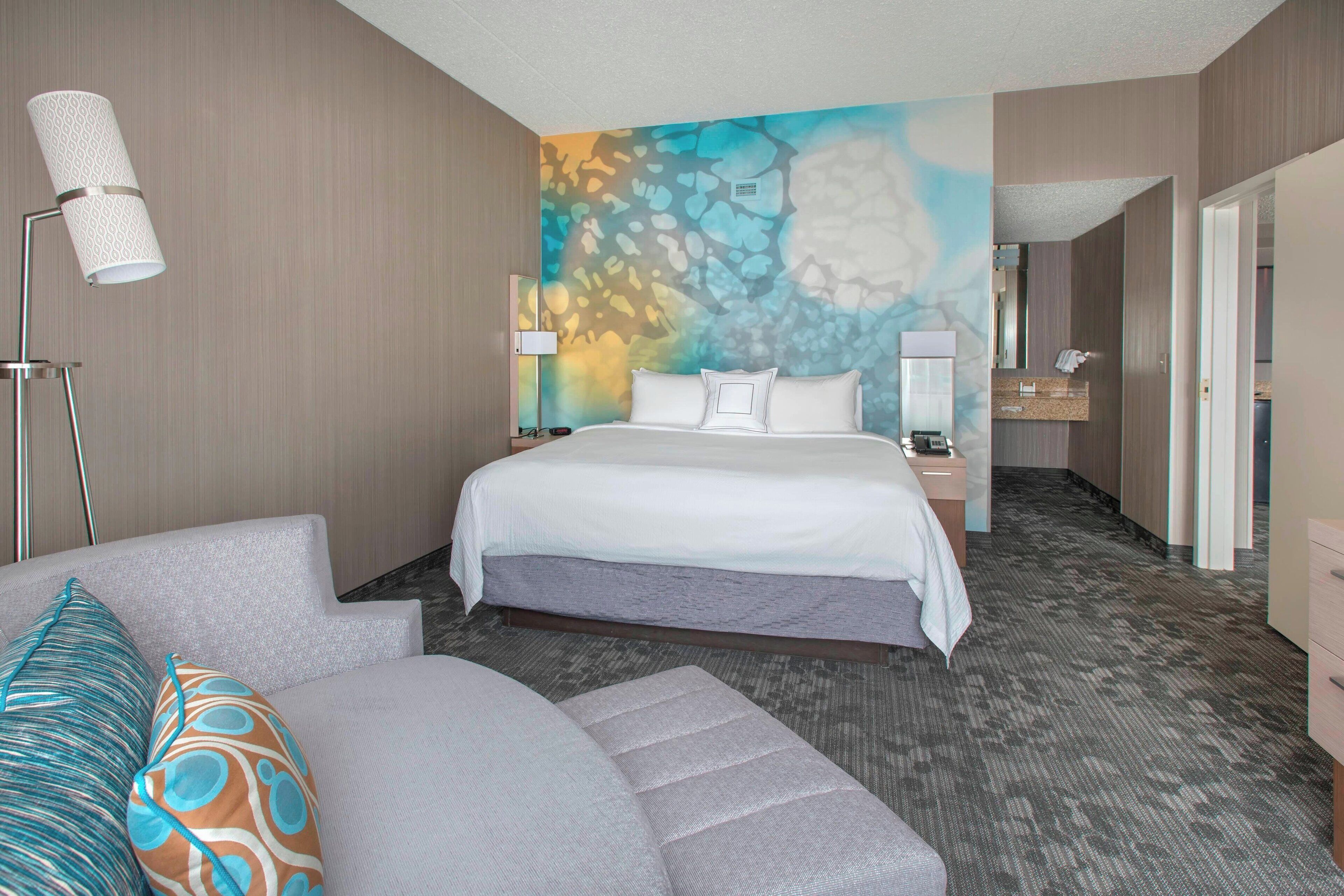 premium bedding, desk, laptop workspace, blackout curtains