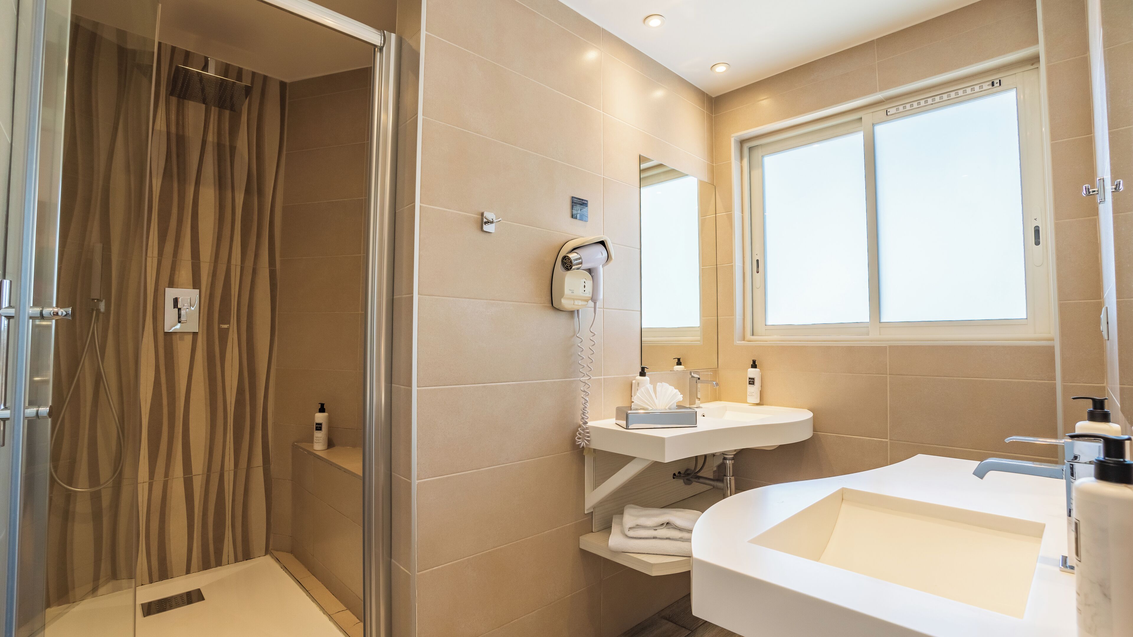 junior suite, 1 queen bed, balcony | bathroom | free toiletries, hair dryer, towels