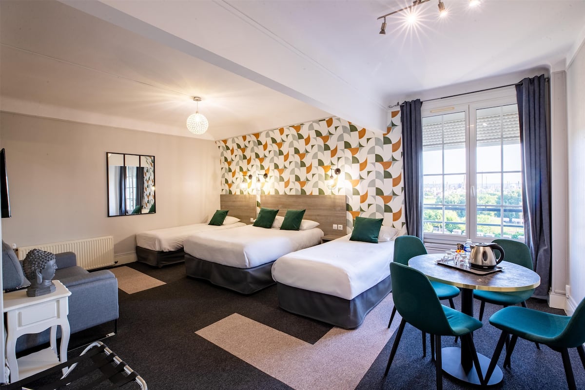 family room, multiple beds, non smoking | in-room safe, desk, iron/ironing board, free wifi