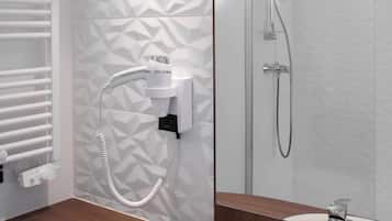Eco-friendly toiletries, hair dryer, towels