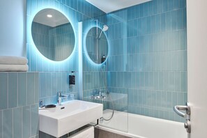Shower, eco-friendly toiletries, hair dryer, towels