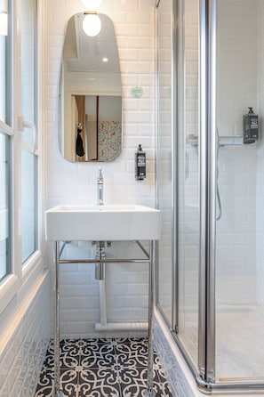 Eco-friendly toiletries, hair dryer, towels, soap