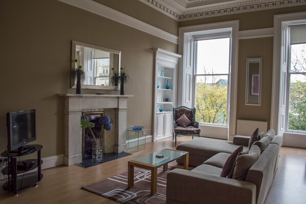 32-inch flat-screen TV with digital channels, LCD TV, DVD player