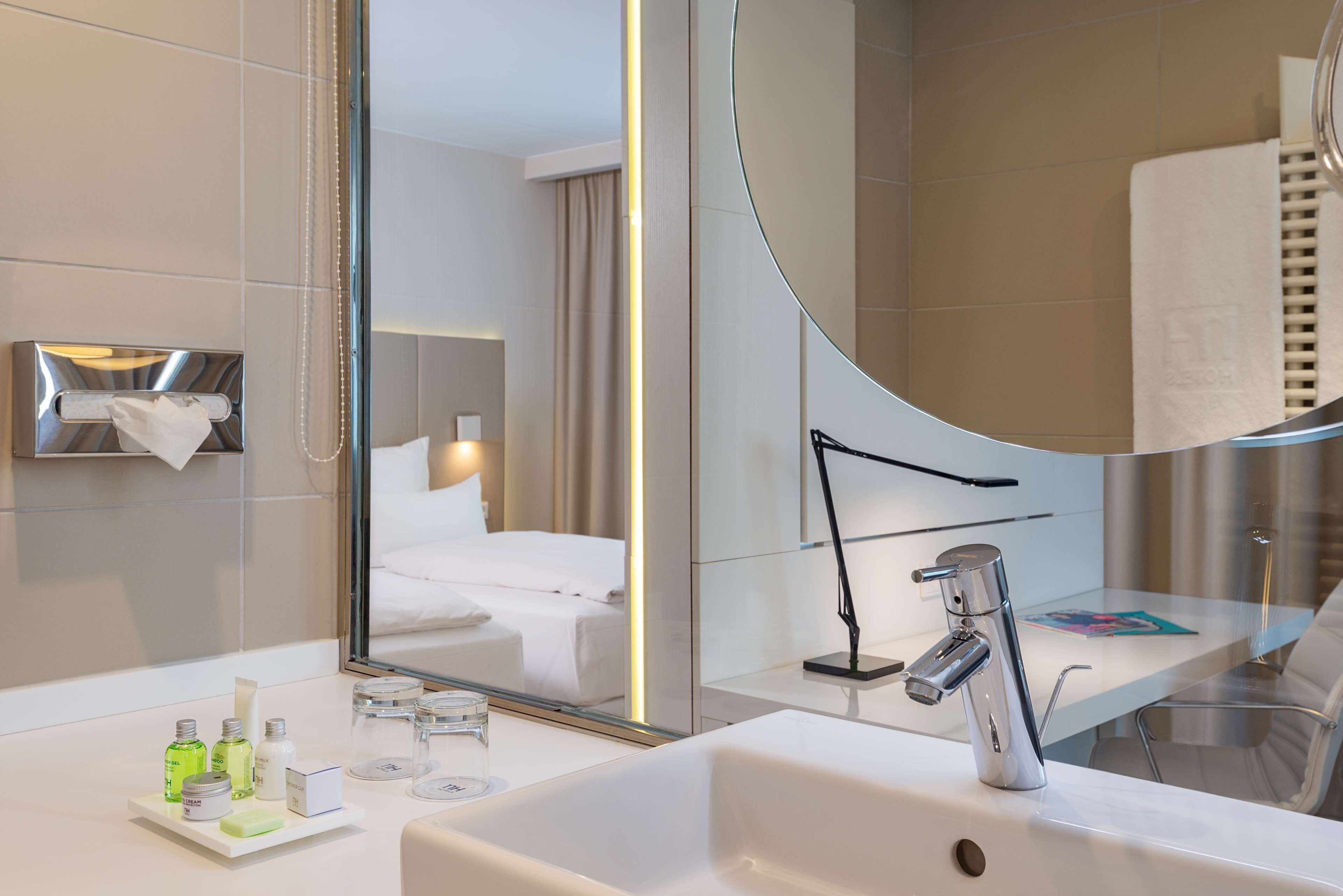 deep-soaking bathtub, rainfall showerhead, eco-friendly toiletries