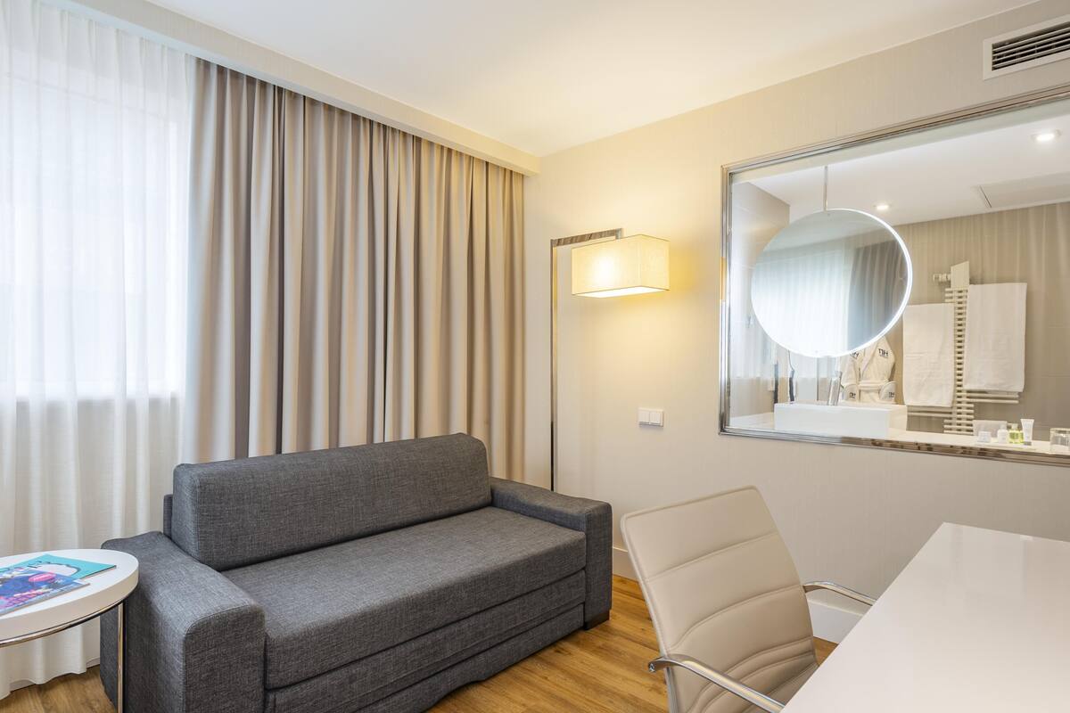 Hypo-allergenic bedding, pillow-top beds, in-room safe, desk