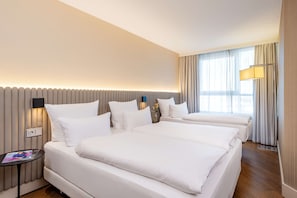 Hypo-allergenic bedding, pillowtop beds, minibar, in-room safe