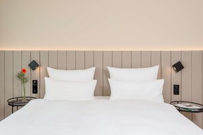 Premium bedding, pillow-top beds, minibar, in-room safe