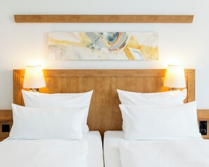 Literie hypoallergénique, minibar, coffres-forts dans les chambres