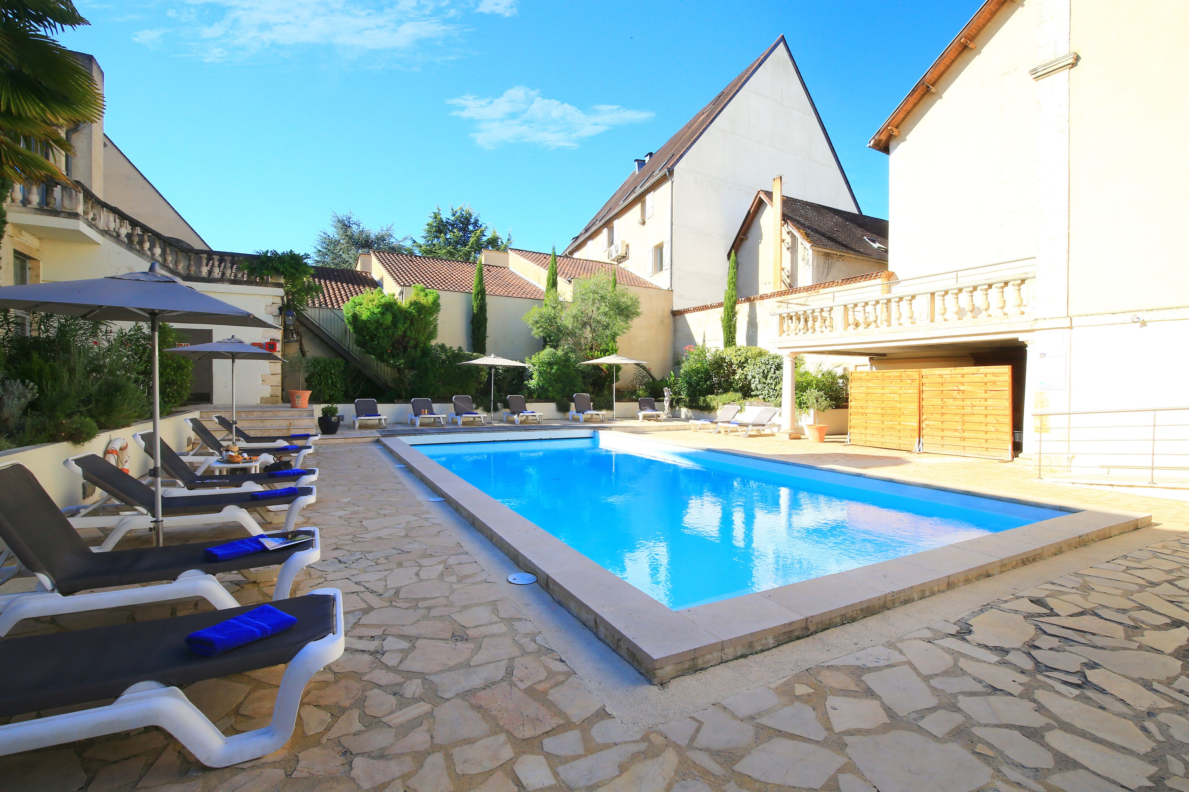 seasonal outdoor pool, open 9:00 am to 8:30 pm, pool loungers