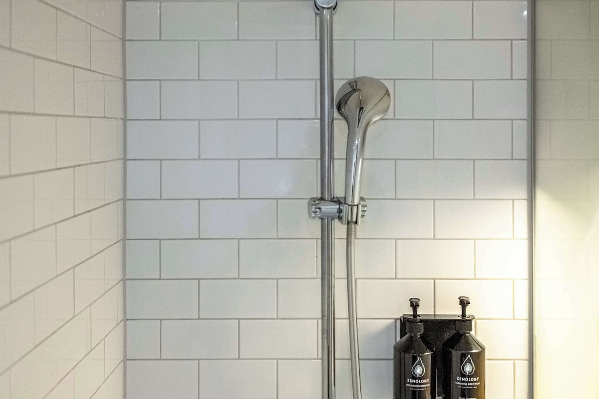 shower, rainfall showerhead, designer toiletries, hair dryer