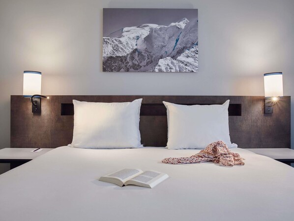 Ropa de cama de alta calidad y camas con pillow-top 