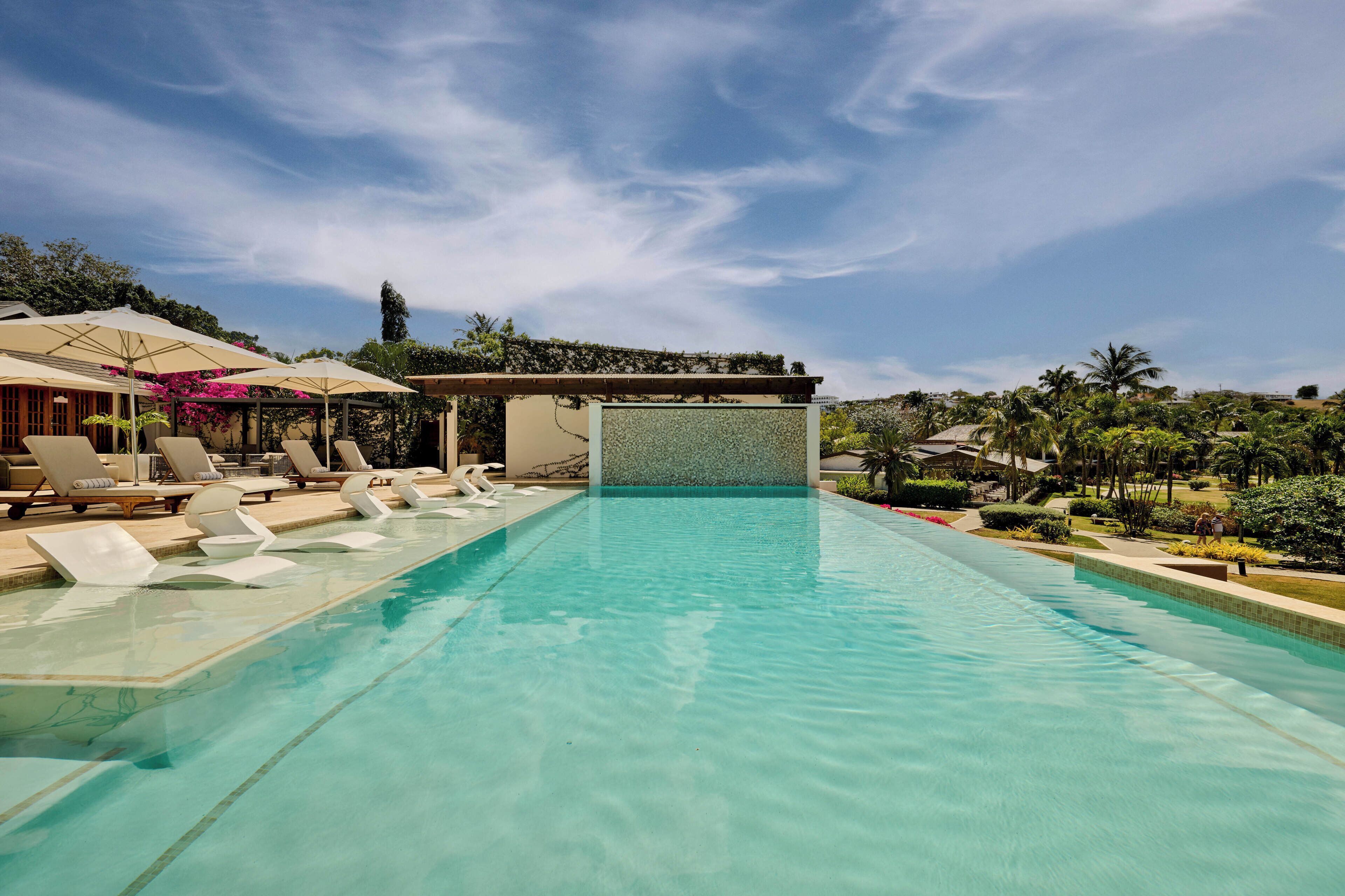 Outdoor pool, pool umbrellas, sun loungers