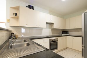 Fridge, electric kettle, highchair, dining tables