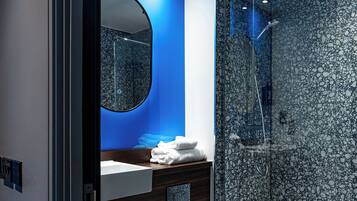 Eco-friendly toiletries, hair dryer, towels