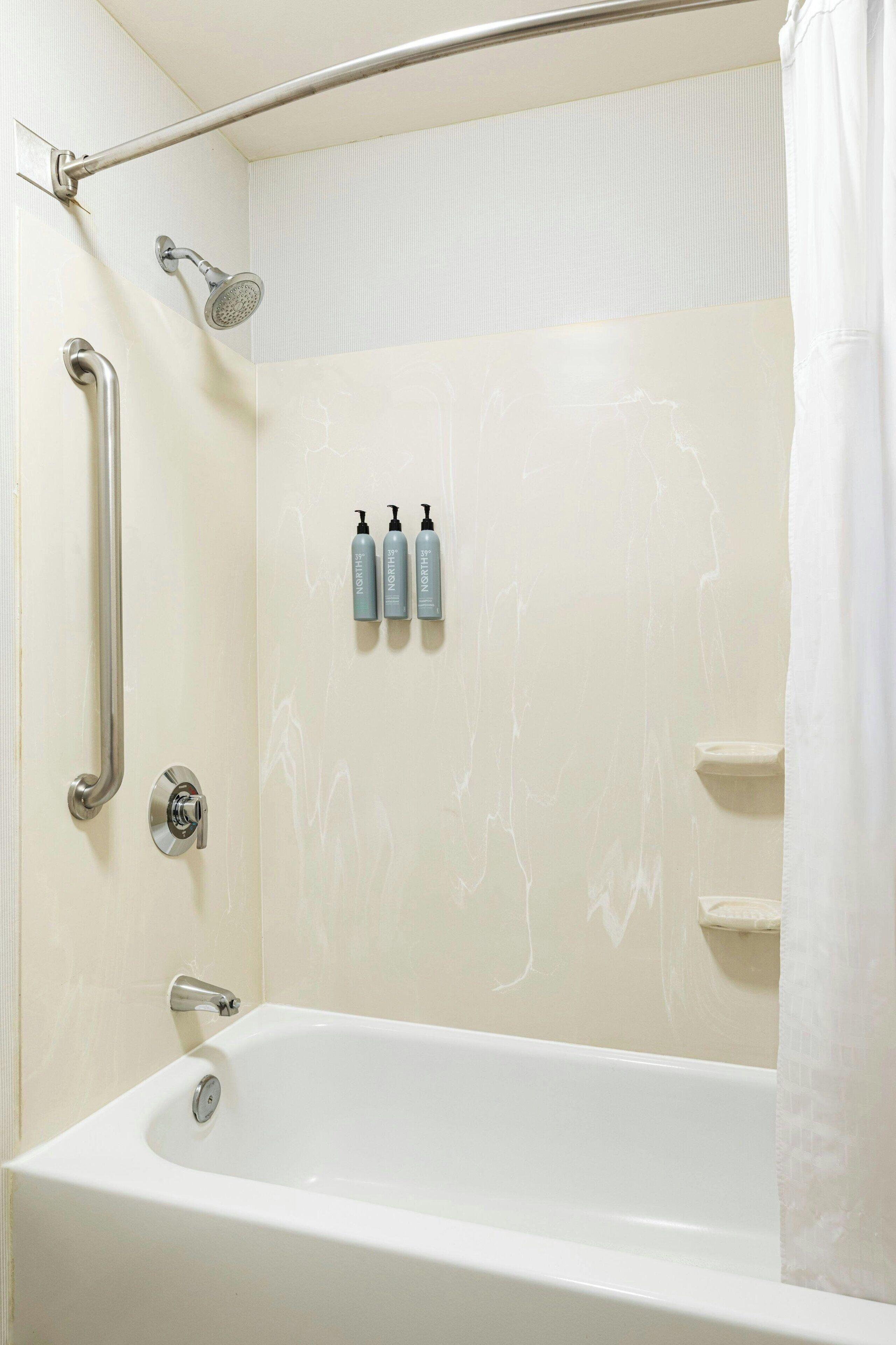 combined shower/bathtub, deep-soaking bathtub, free toiletries
