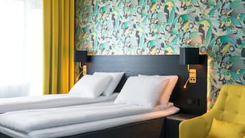 Sengetøy av topp kvalitet, minibar, safe på rommet og skrivebord