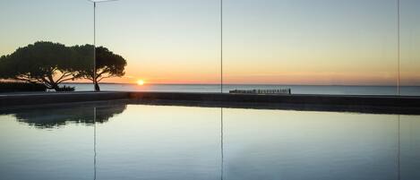 Indoor pool, open 8:30 AM to 9 PM, pool loungers