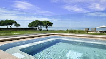 Indoor pool, open 8:30 AM to 9 PM, pool loungers