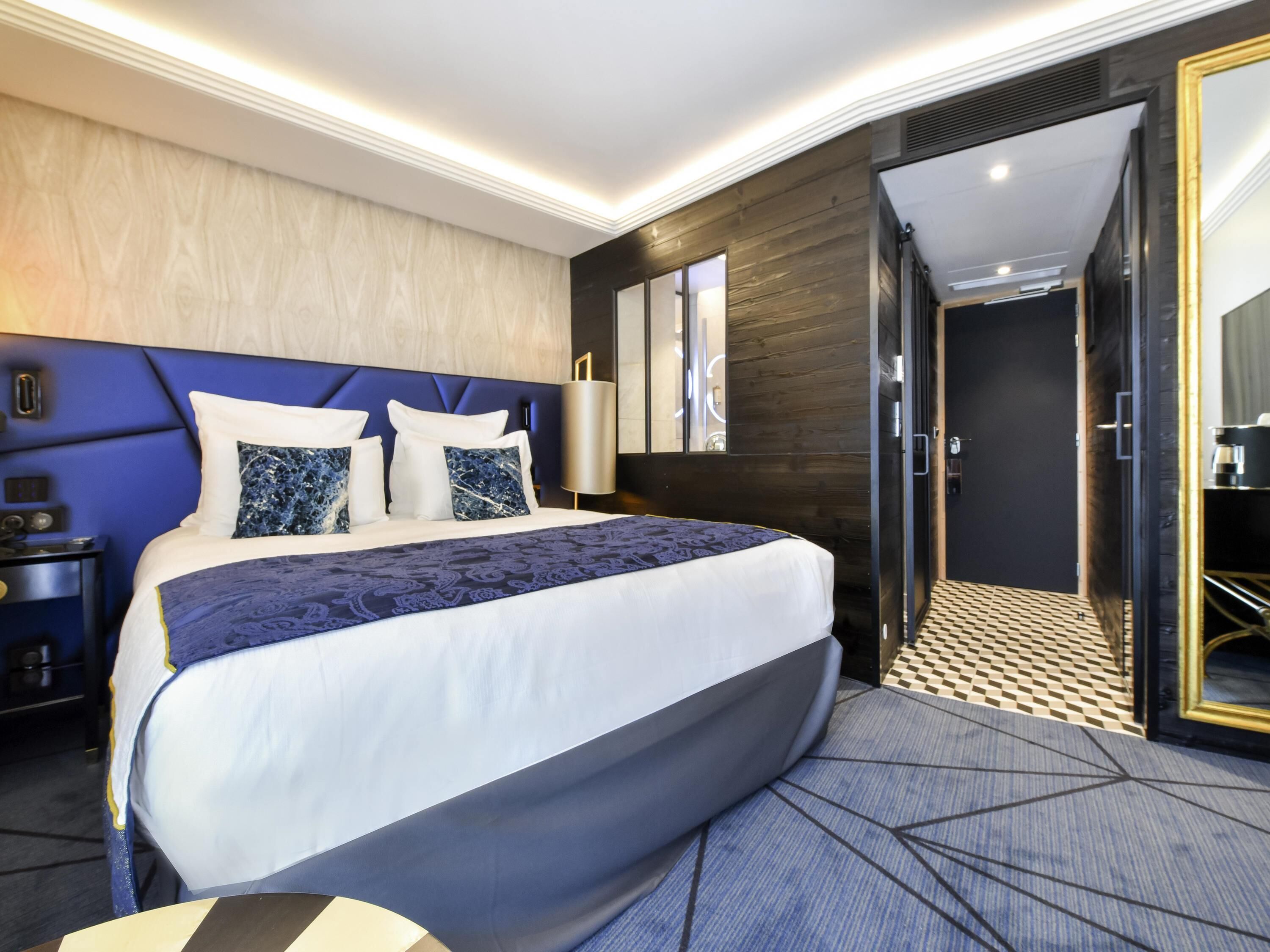 Premium bedding, down comforters, pillowtop beds, minibar