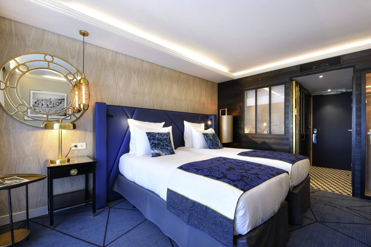 Premium bedding, down comforters, pillowtop beds, minibar
