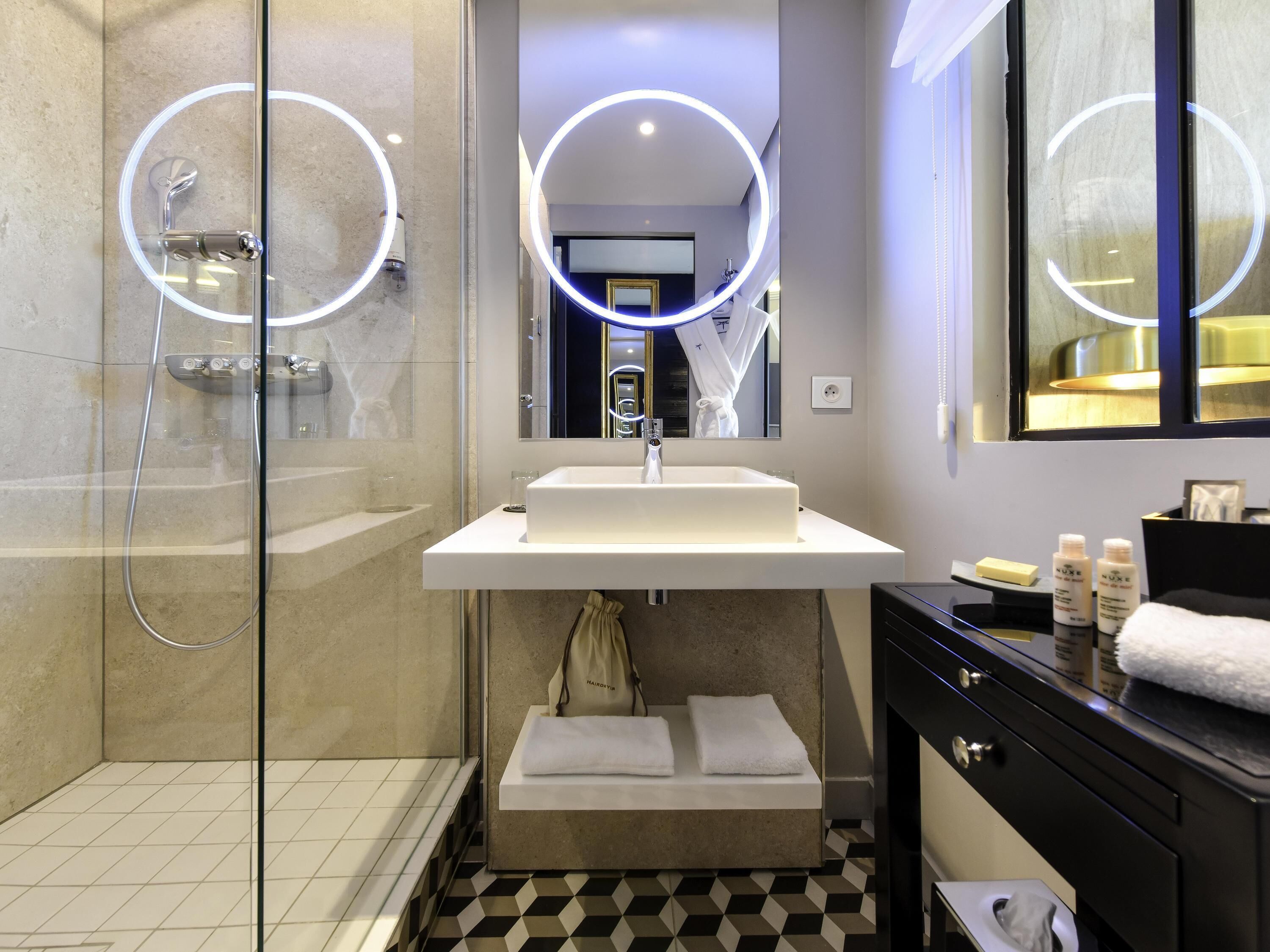 Eco-friendly toiletries, hair dryer, bathrobes, slippers