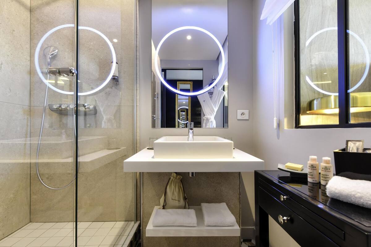 Eco-friendly toiletries, hair dryer, bathrobes, slippers