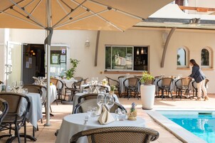Breakfast, lunch, dinner served; French cuisine, pool views 
