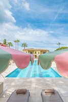 Seasonal outdoor pool, open 8:00 AM to 10:00 PM, pool umbrellas