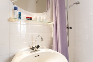 Shower, free toiletries, hair dryer, towels