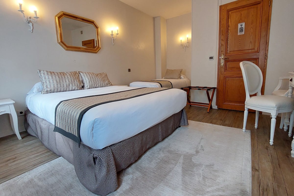 Triple Room | Premium bedding, individually decorated, desk, blackout drapes