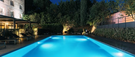 Seasonal outdoor pool, pool umbrellas, pool loungers