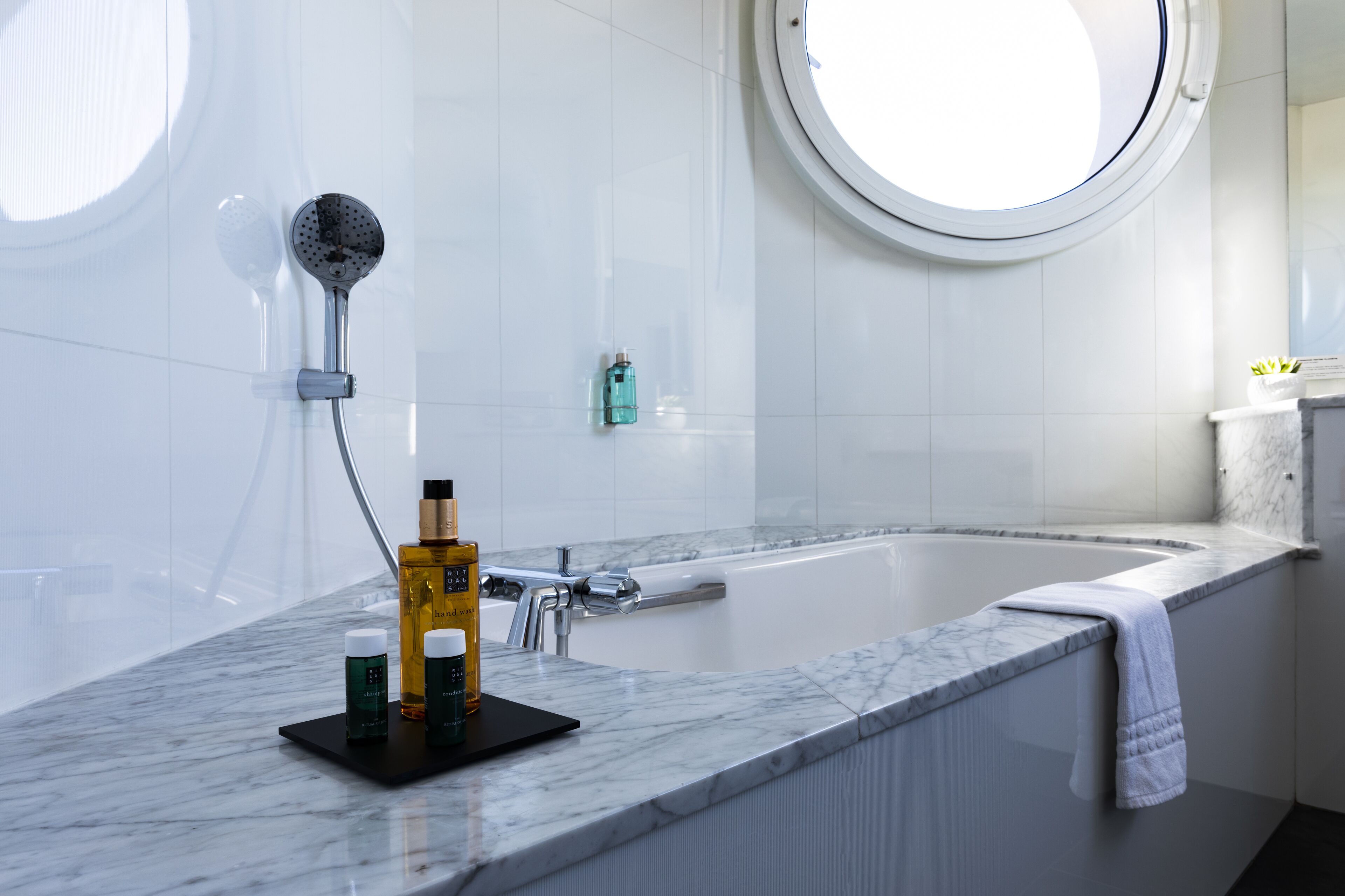 deluxe double room | bathroom | shower, free toiletries, hair dryer, towels