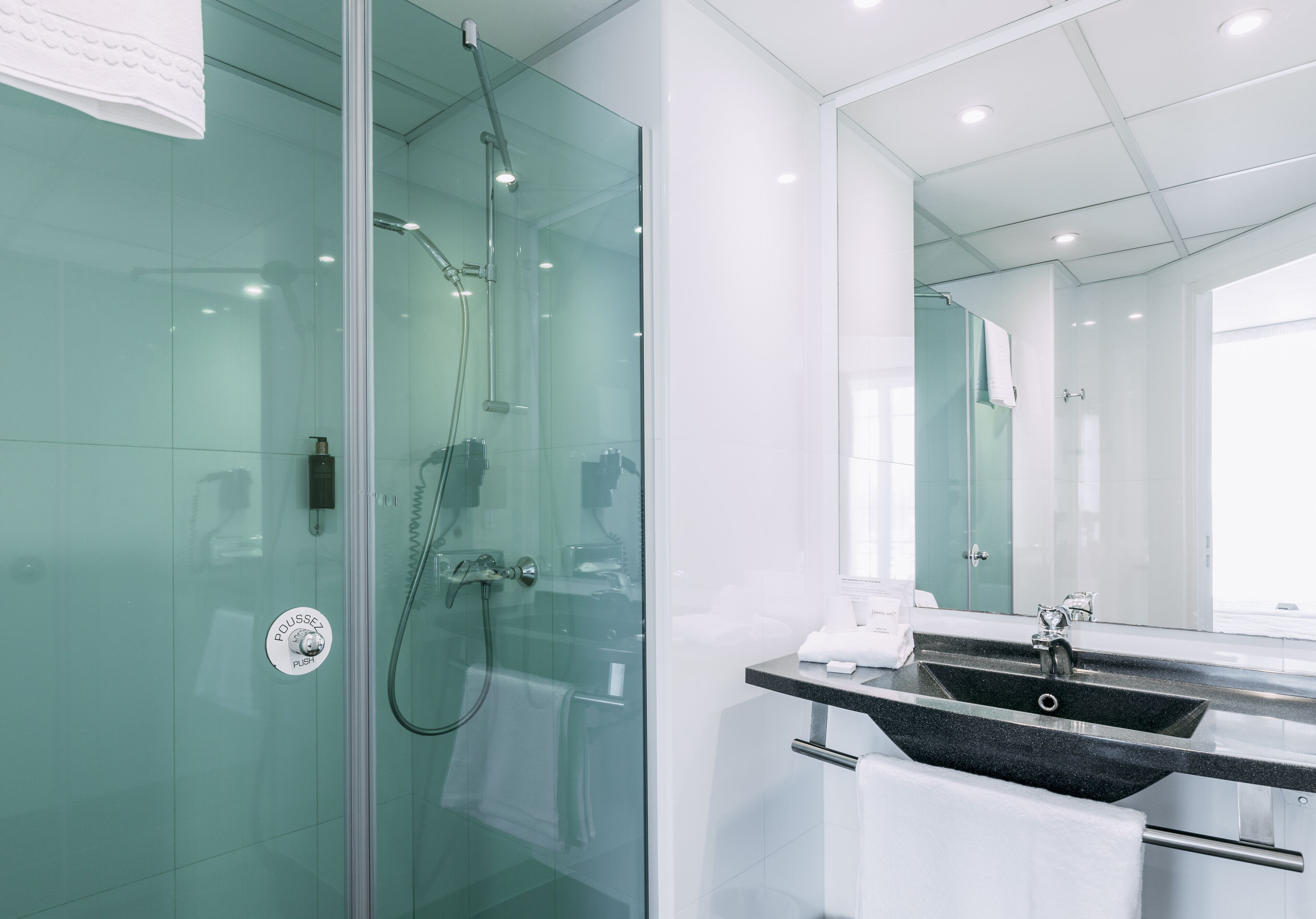 shower, free toiletries, hair dryer, towels