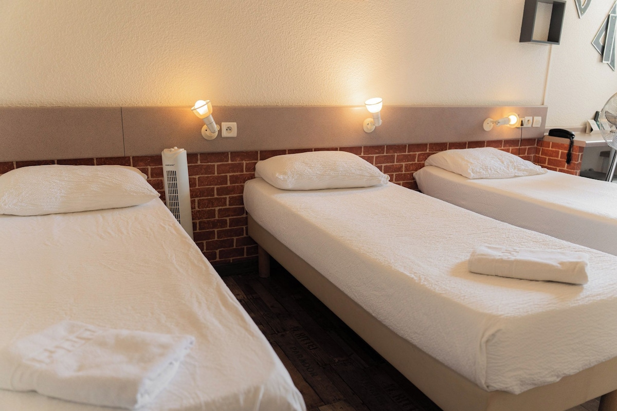 Standard Triple Room | Desk, blackout drapes, WiFi (free), individually decorated