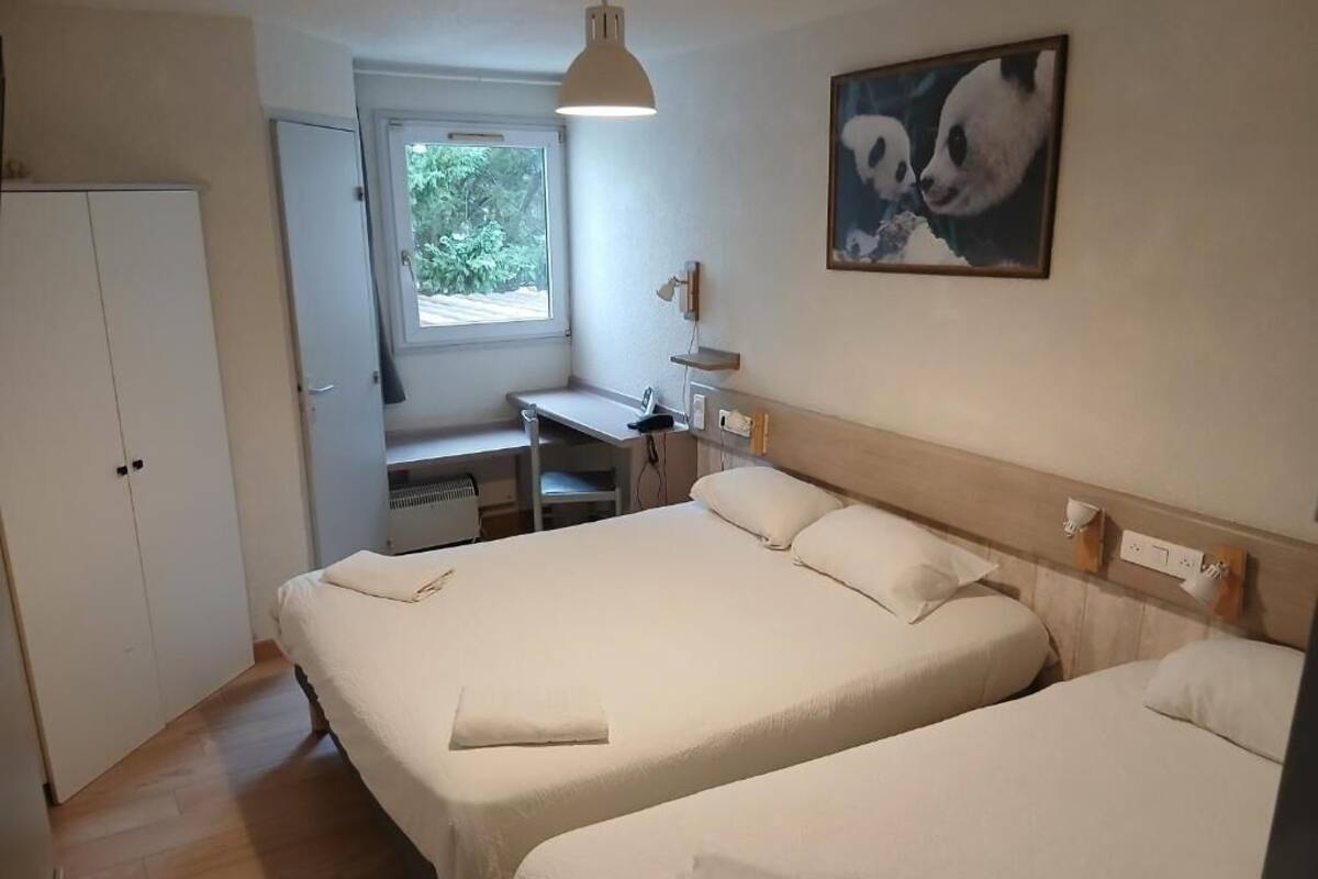 Triple Room | Desk, blackout drapes, WiFi (free), individually decorated