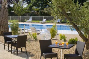 Seasonal outdoor pool, pool umbrellas, sun loungers