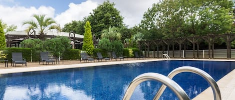 Seasonal outdoor pool, pool umbrellas, sun loungers