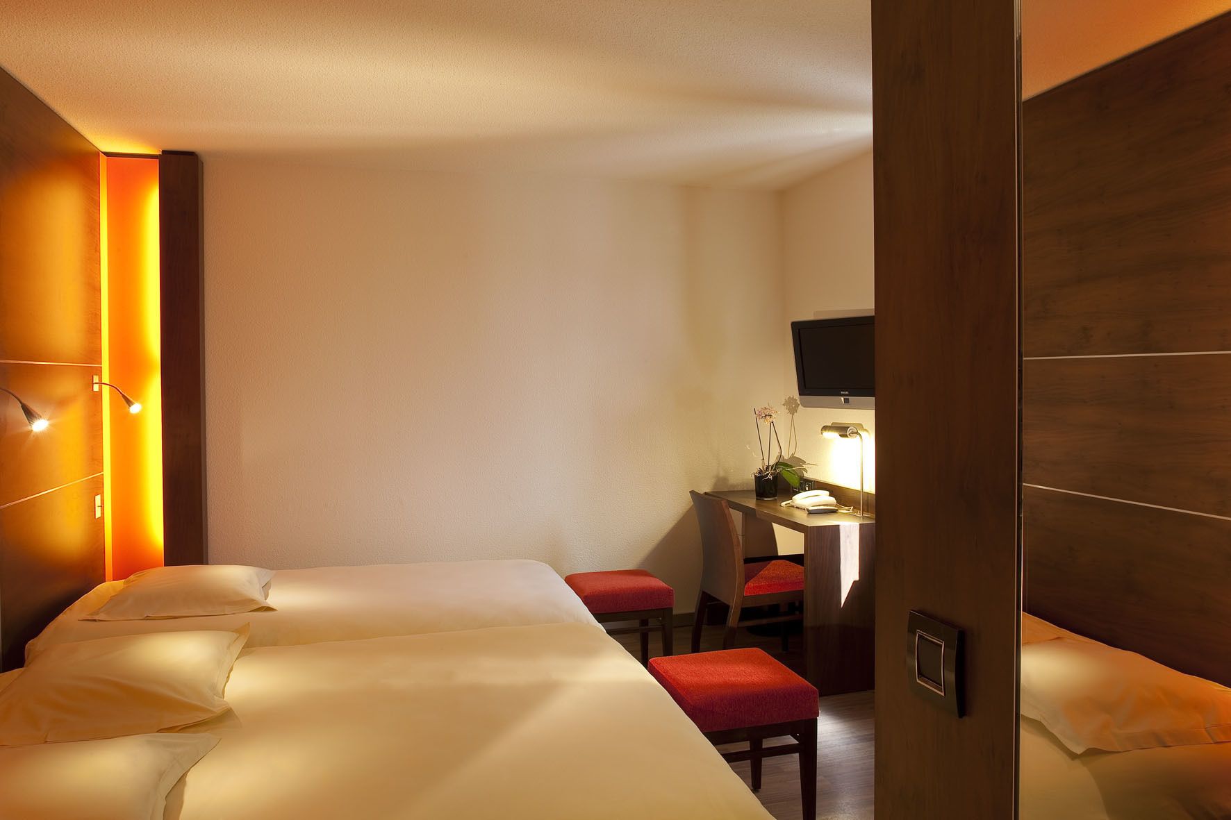 comfort triple room | premium bedding, in-room safe, desk, blackout curtains