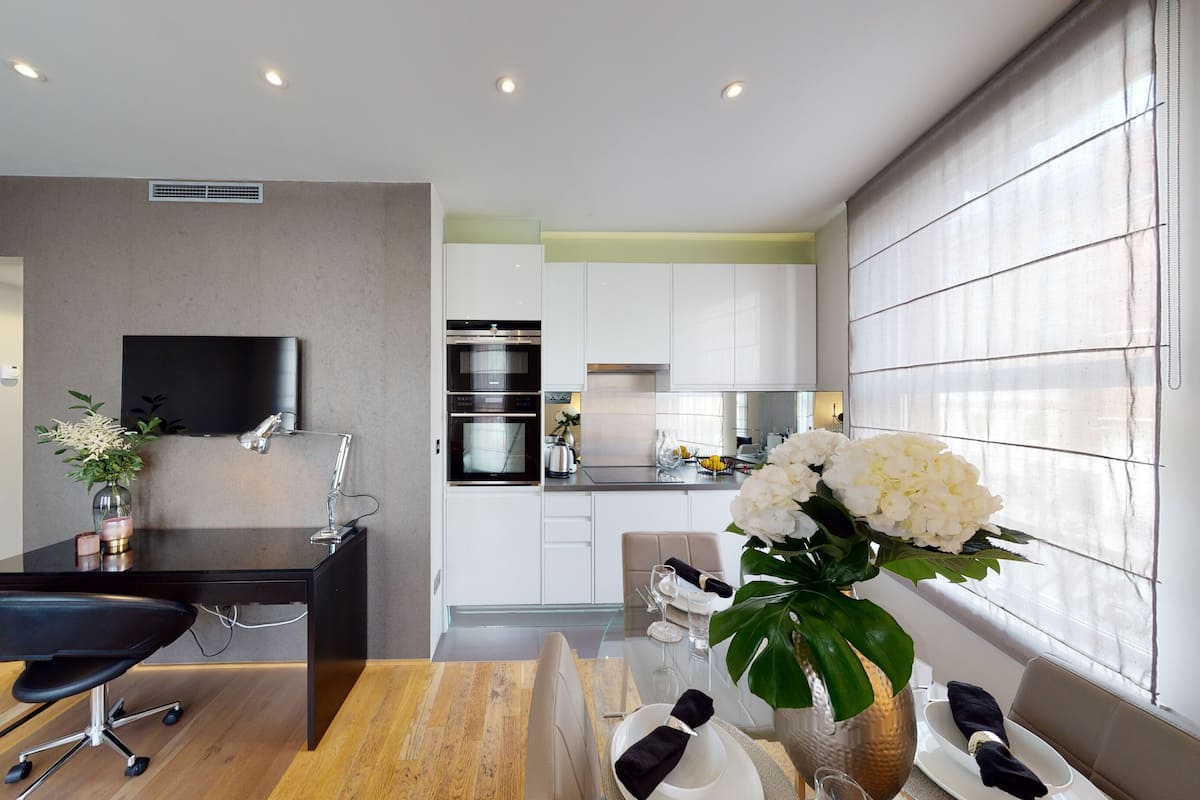 Apartamento executivo, 1 quarto | Área de estar