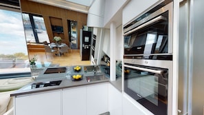 Executive Penthouse, 1 Double Bed, Kitchen | Private kitchen | Full-size fridge, microwave, oven, stovetop