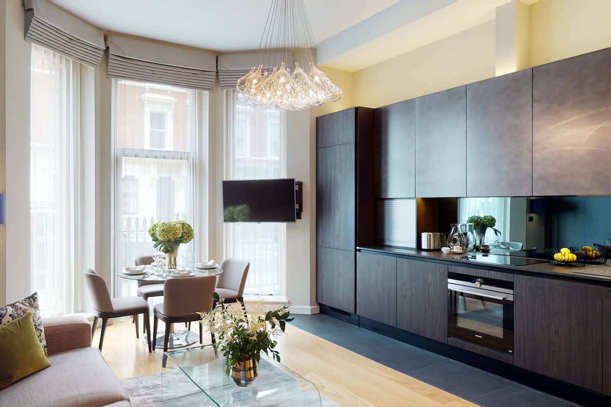 Apartamento executivo, 2 quartos | Sala de estar
