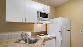 Studio, 1 Queen Bed, Non Smoking | Private kitchen | Full-size fridge, microwave, stovetop, coffee/tea maker