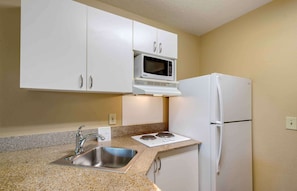 Studio, 1 Queen Bed, Non Smoking | Private kitchen | Full-size fridge, microwave, stovetop, coffee/tea maker