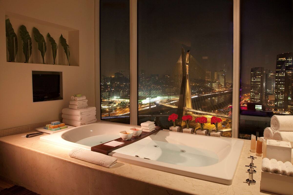 separate bathtub and shower, designer toiletries, hair dryer, bathrobes