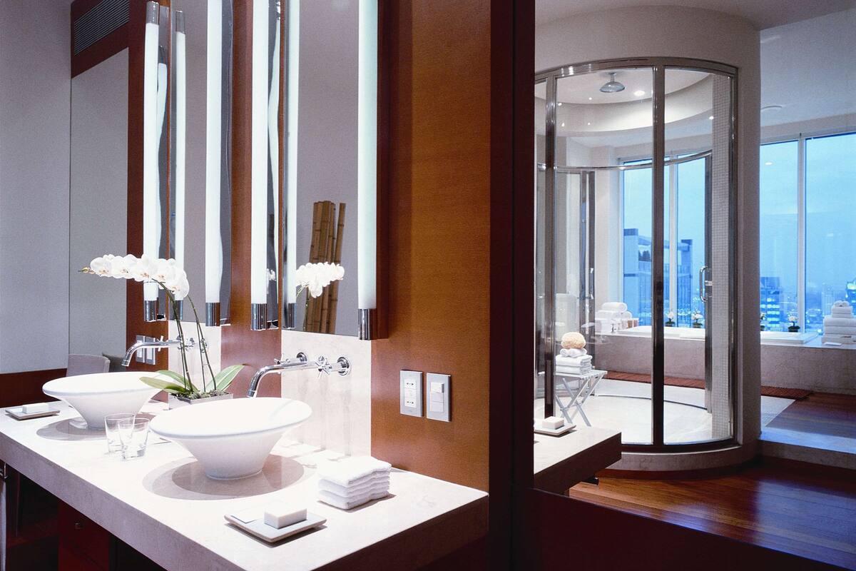 separate bathtub and shower, designer toiletries, hair dryer, bathrobes